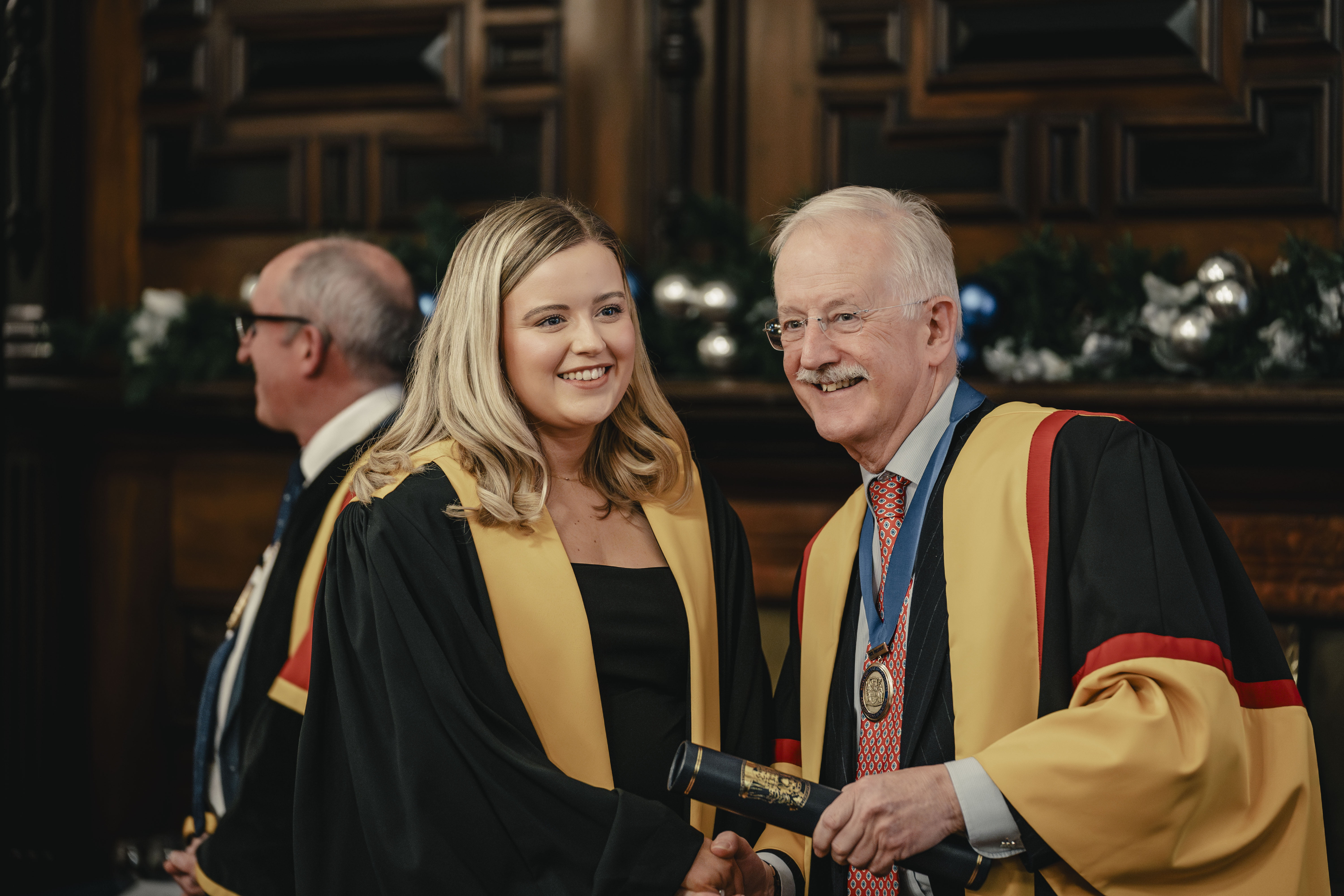 A physicians diplomat receiving their diploma
