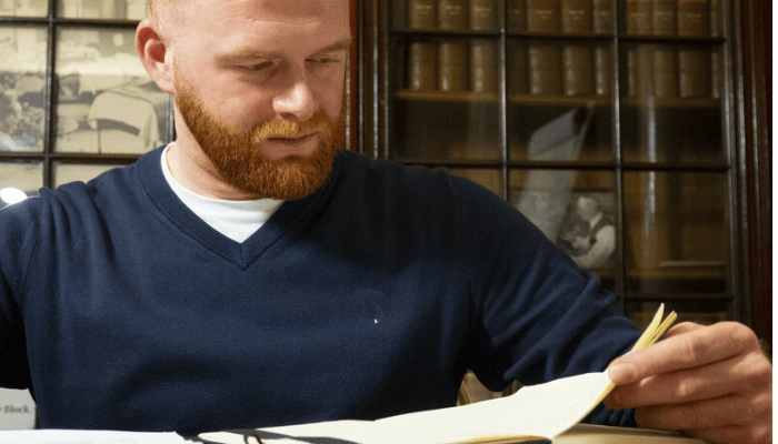 a man reading a document