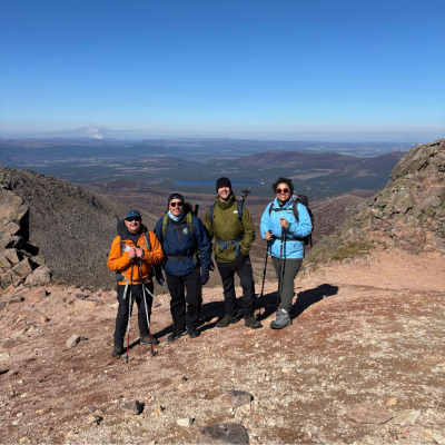 a group at the top of a mountain
