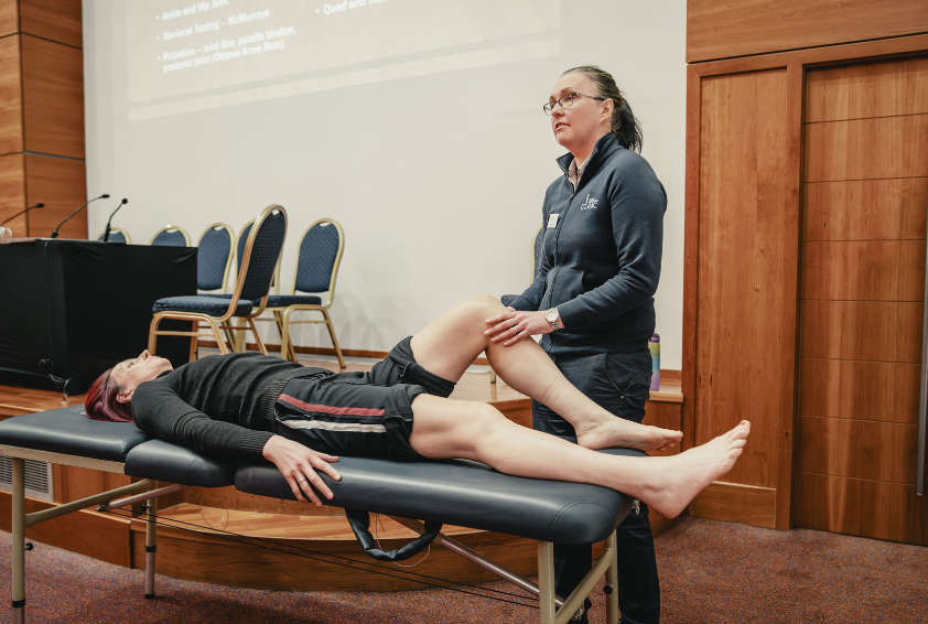 Trainer demonstration of lower limb